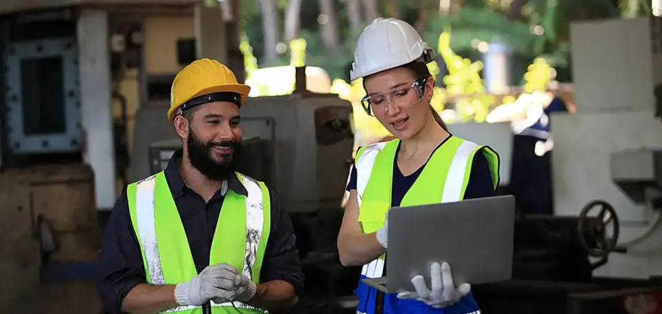 Engineer on site working for production or maintenance big machine industry in factory