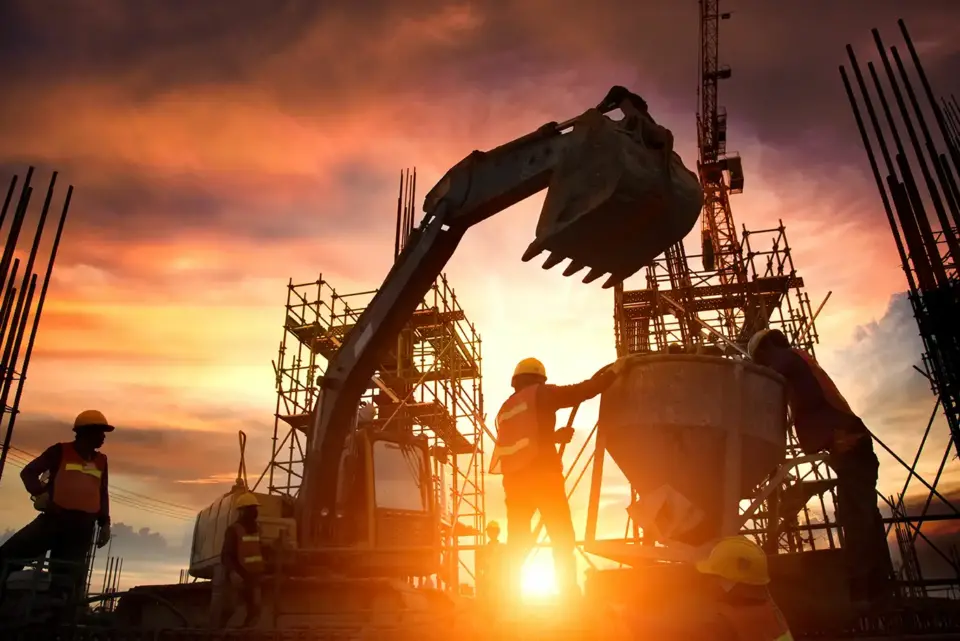 excavator at sunset
