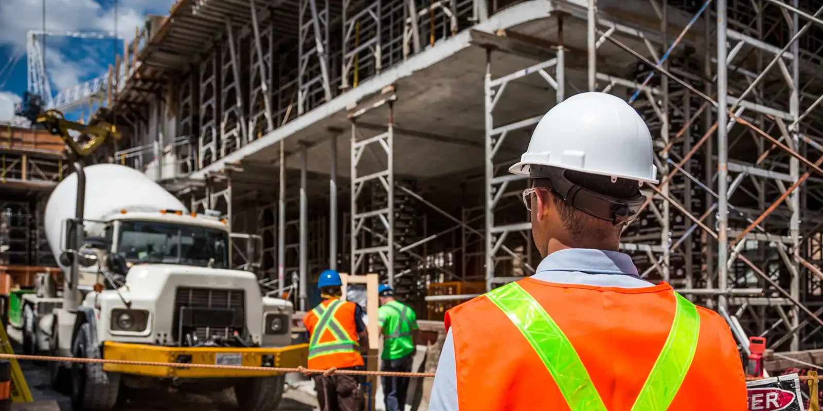 Site supervisor watching his team