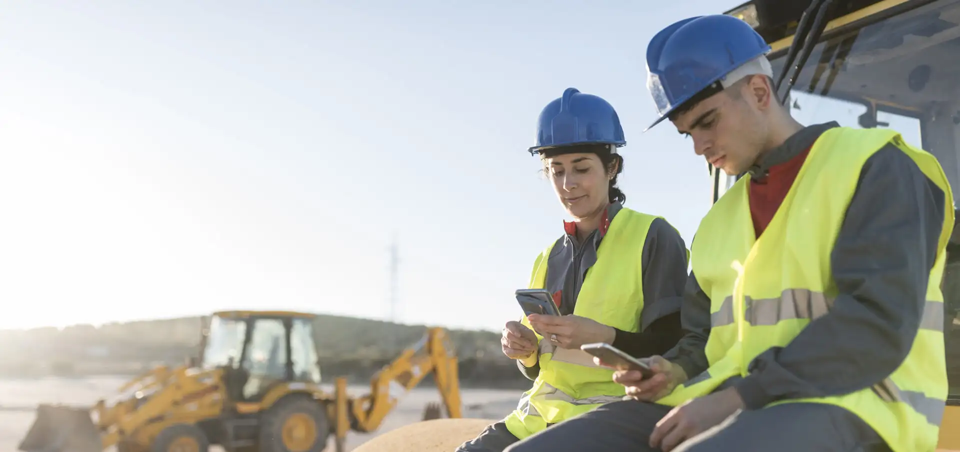 Couple of workers taking a break on the jobsite