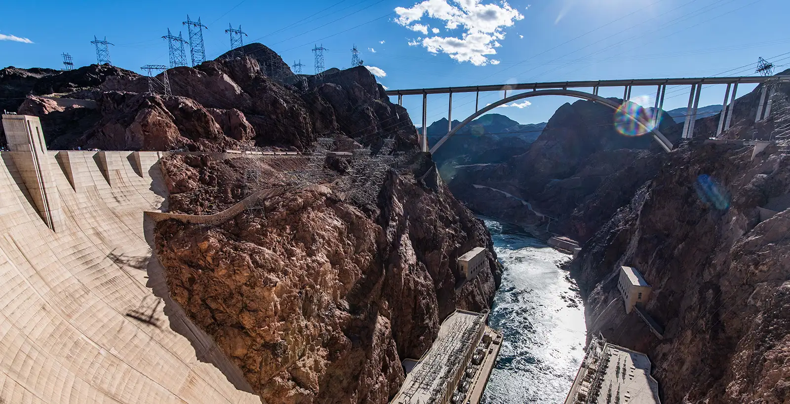 Panoramic picture of Hoover Dam and Mike O'Callaghan - Pat Tillman Memorial Bridge connecting Arizona and Nevada over Colorado River, USA