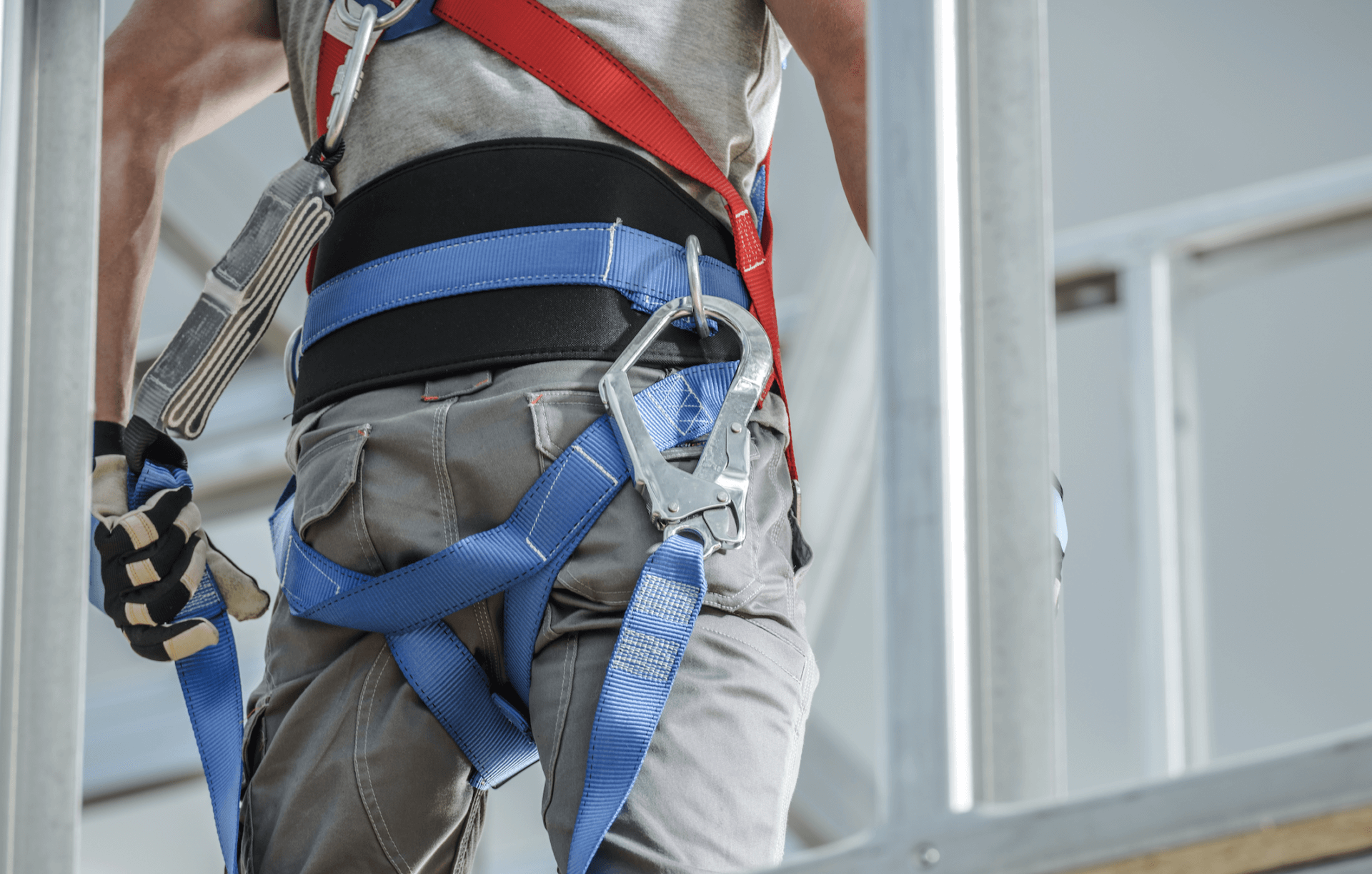 construction worker wearing a safety harness