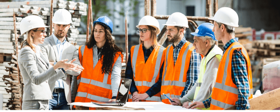a construction team holding a pre-shift toolbox talk